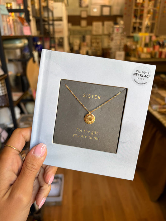 Book with Necklace